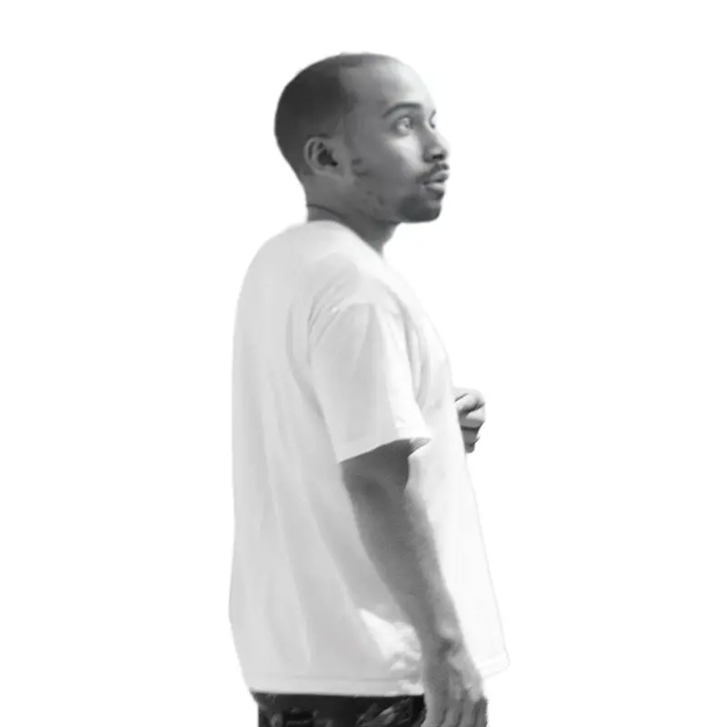 Grayscale photograph of a man looking forward turned to the right